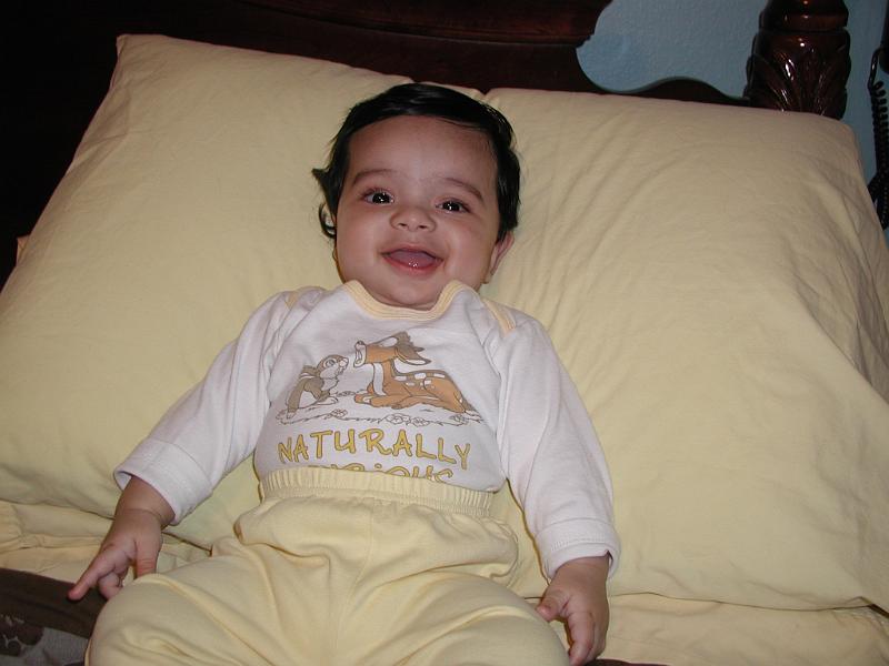 PA130001.JPG - This is Rohan. Typically a very happy kid. He is now 5 months old, sleeping thru the night (his defination of night) and eating solid food. His solid food consists of mashed carrots and green beans etc. He is slowly working his way up to Goan sausage and tandoori chicken.
