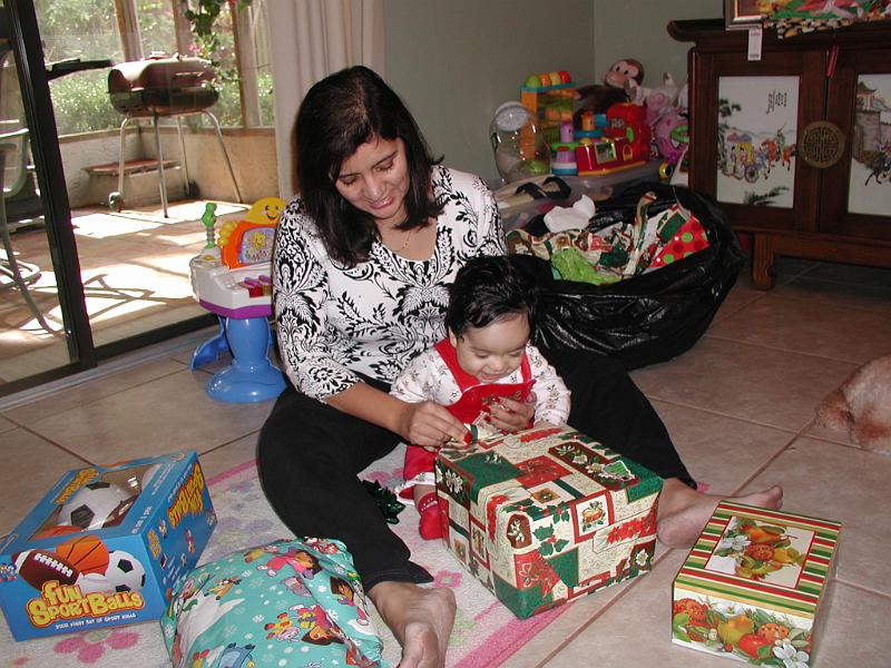 PC250083.JPG - Rohan looking at a present - he is very happy.