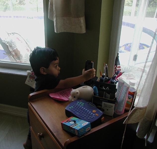 P9020204.JPG - Putting back the phone after the conversation